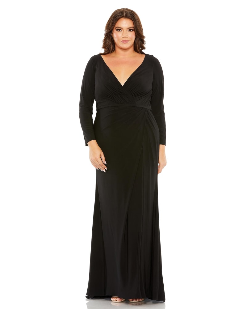 Front of a model wearing a size 14W Long Sleeve V-Neck Faux Wrap Gown in Black by Mac Duggal. | dia_product_style_image_id:289838